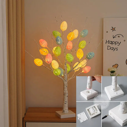 White birch-style LED Easter tree with warm white lights and cracked egg decorations on adjustable branches