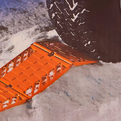 Pair of orange folding anti-slip car rescue boards for snow and mud recovery