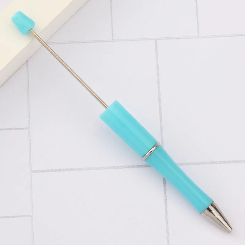 Rotating bead ballpoint pen in gradient colour with ABS plastic and steel wire construction