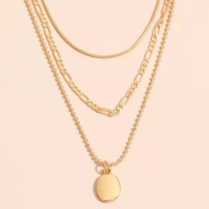 Vintage geometric metal oval pendant necklace in gold or silver