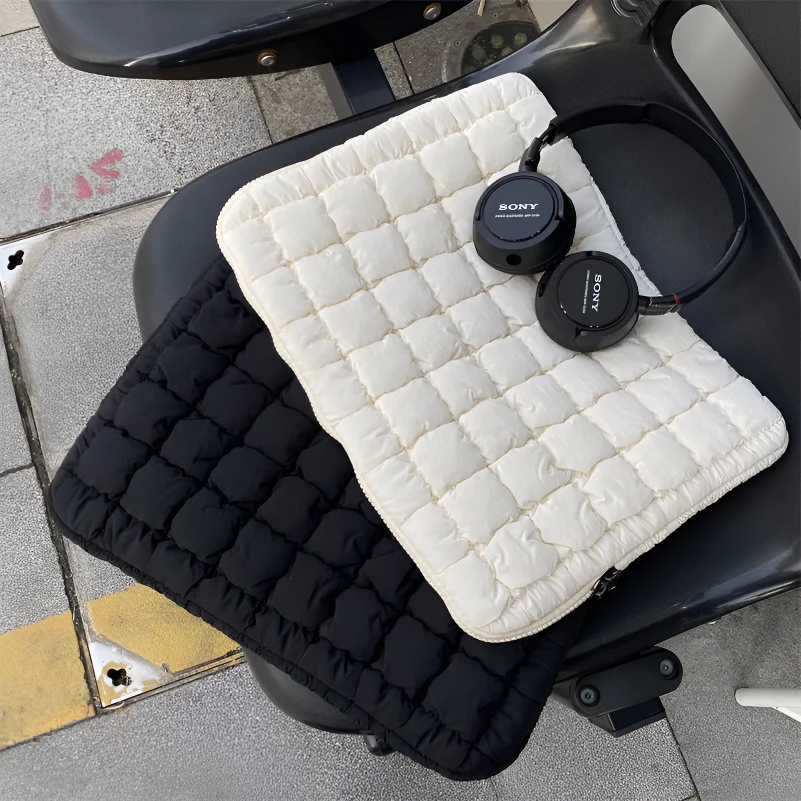 Black and white large capacity nylon laptop bag for 11, 14, and 15.6 inch computers.