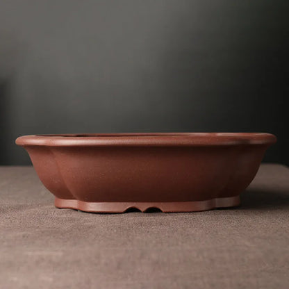 Handmade rectangular purple clay bonsai basin with classical Chinese design, measuring 25cm by 20cm by 7cm
