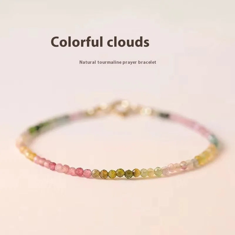 Women's handmade bracelet with rainbow fluorite stones in copper geometric quadrilateral settings