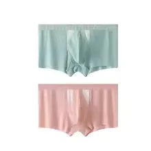 Man wearing black ice silk double-layer underwear shorts with a hole bag design for dry wet separation.