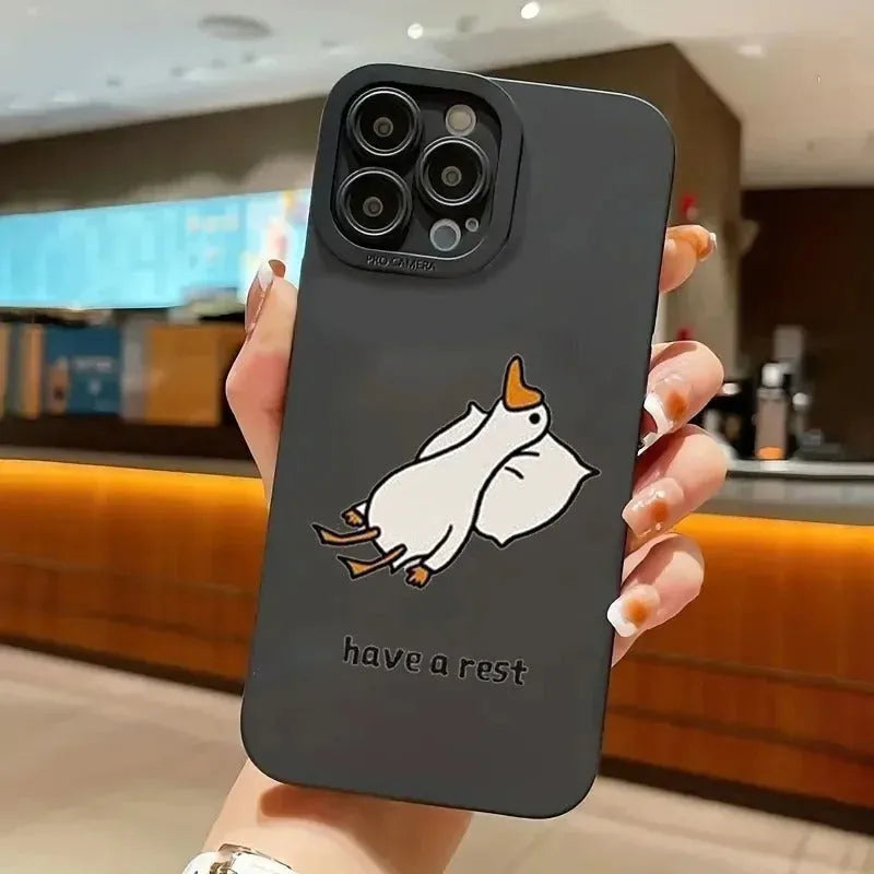 Black silicone iPhone case with a raised carved cartoon duck design on the back.