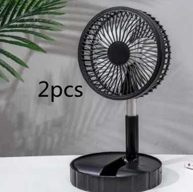 Black telescopic portable folding fan shown extended to full height on a desk, with control panel visible.