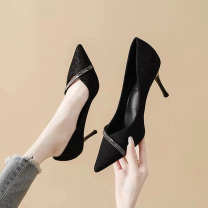 Women's black and gold pointed toe stiletto high heels with low-cut vamp