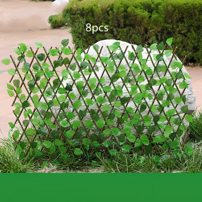 Plastic simulation wooden fence panel showing realistic wood grain texture in outdoor setting