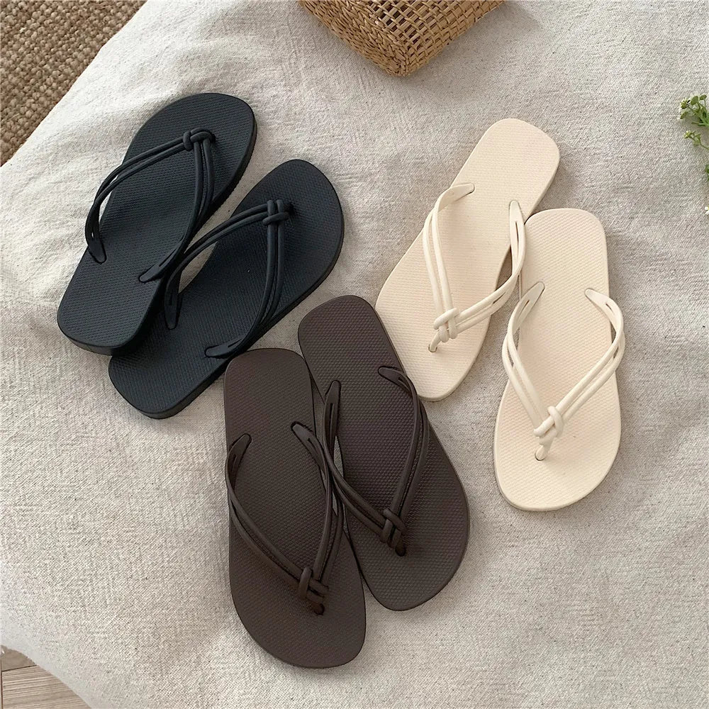 PVC injection moulded flip flops in toe-covering casual style with non-slip sole