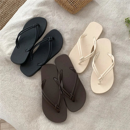PVC injection moulded flip flops in toe-covering casual style with non-slip sole