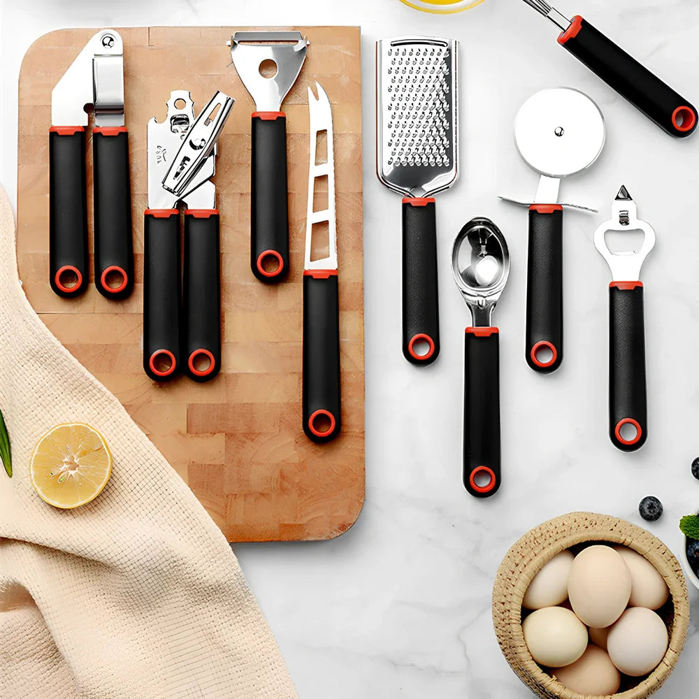 9-piece stainless steel kitchen utensils with black plastic handles arranged for food preparation