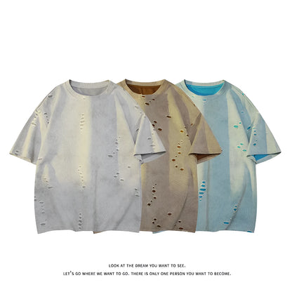 Men's blue loose fit ripped short sleeve cotton blend t-shirt on a hanger