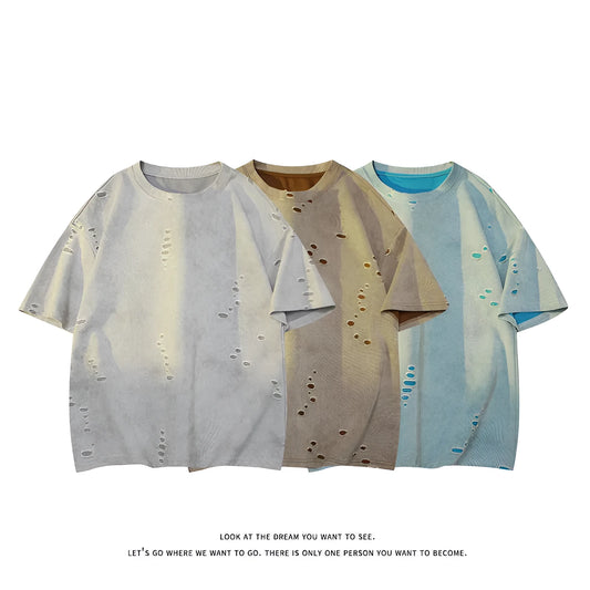 Men's blue loose fit ripped short sleeve cotton blend t-shirt on a hanger