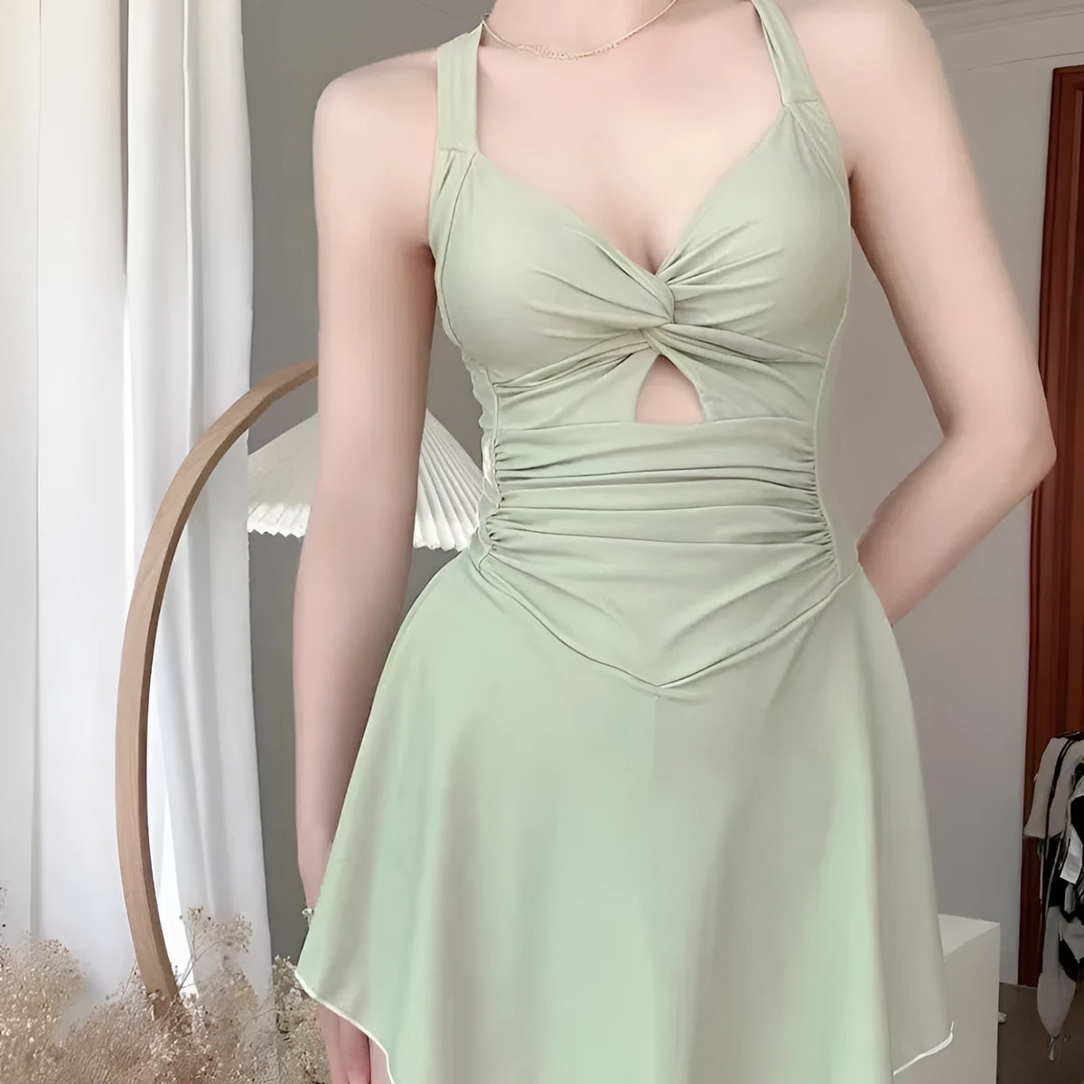 Solid colour one-piece swimsuit for women showing backless conservative design on a mannequin.
