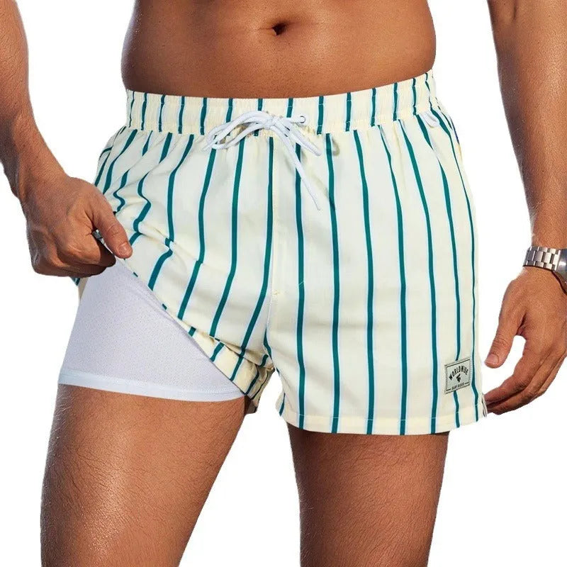 Men's loose quick-drying boxer swimming trunks in spandex fabric with various colour patterns
