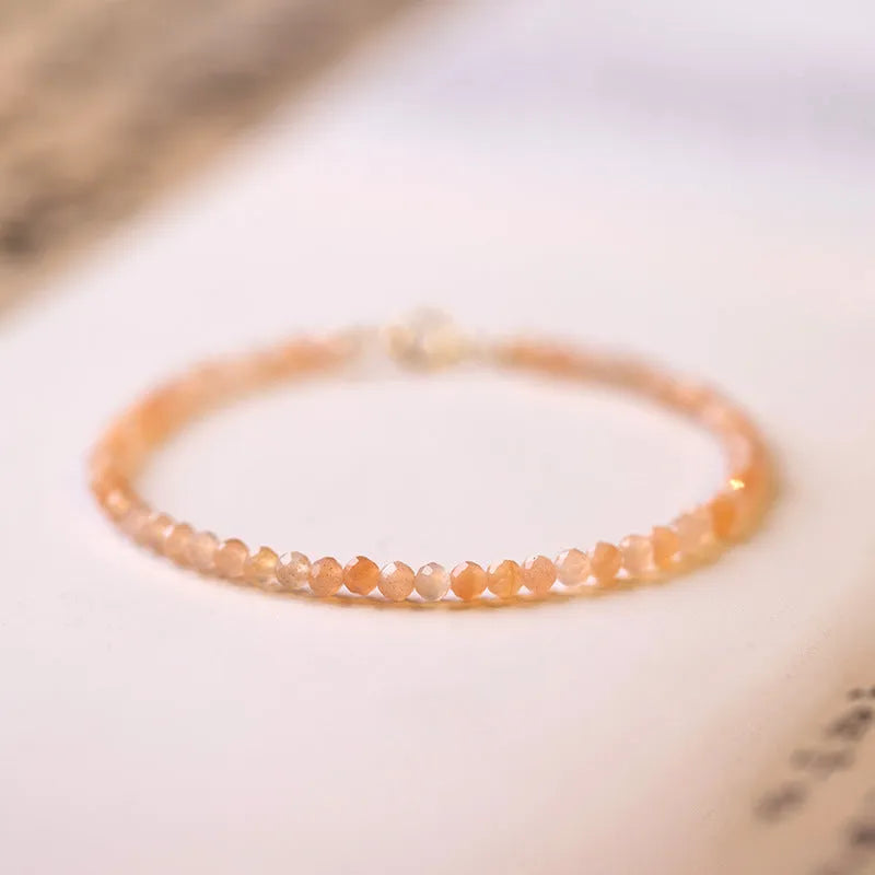 Ultra-thin 3mm Sunstone crystal bracelet showing natural beads and sizing options