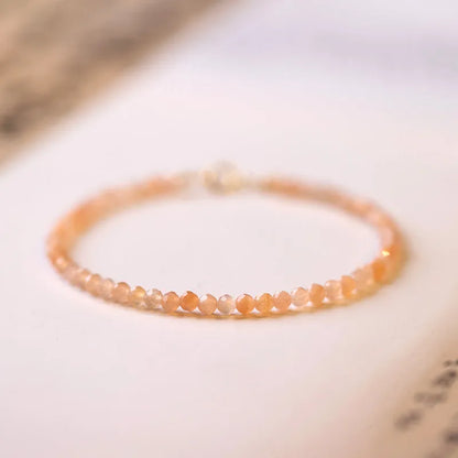 Ultra-thin 3mm Sunstone crystal bracelet showing natural beads and sizing options