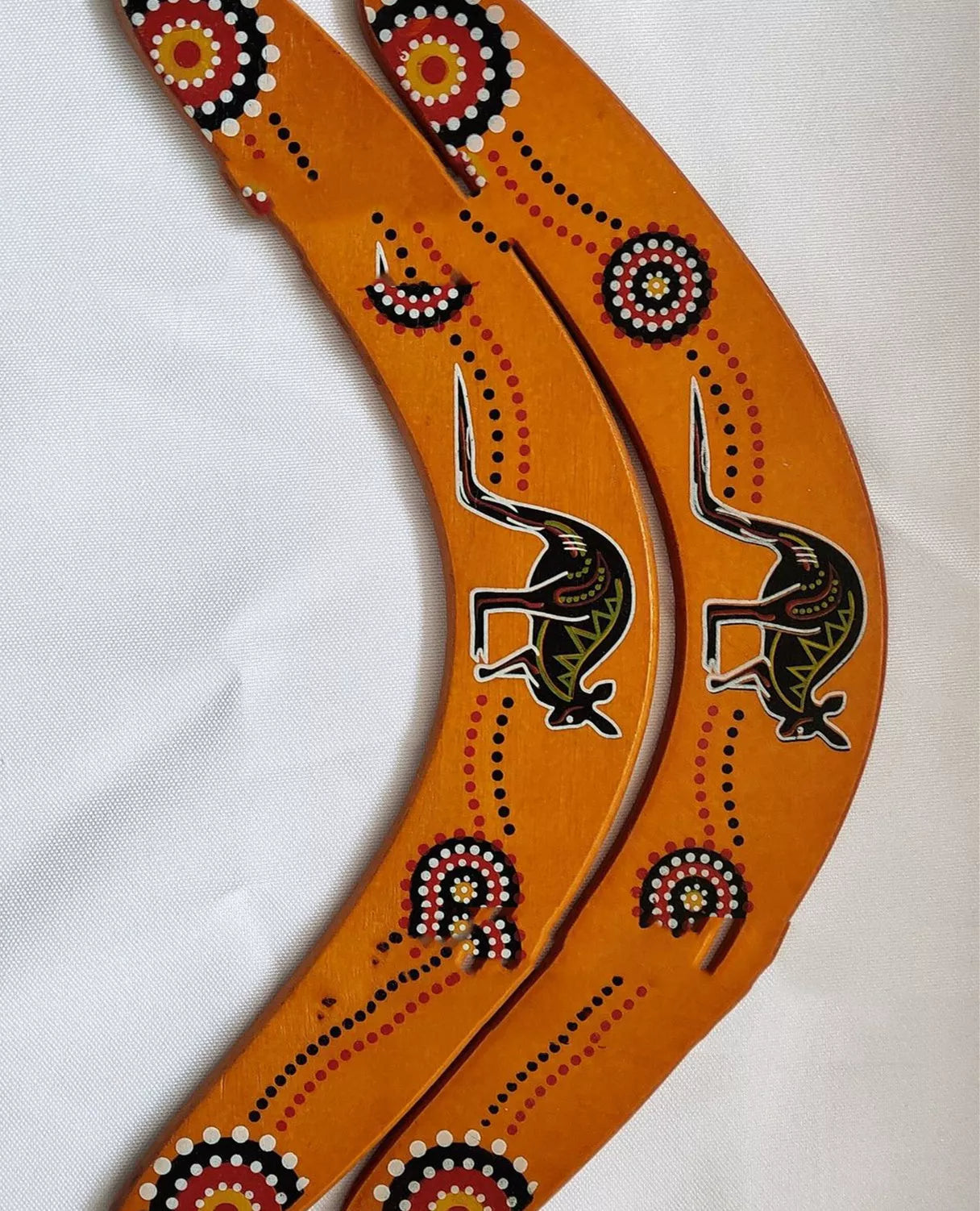 Black wooden revolving dart with kangaroo design for outdoor sports