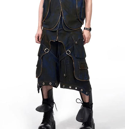 Blue hooded denim vest coat with front zip worn with matching trousers in a two-piece set.