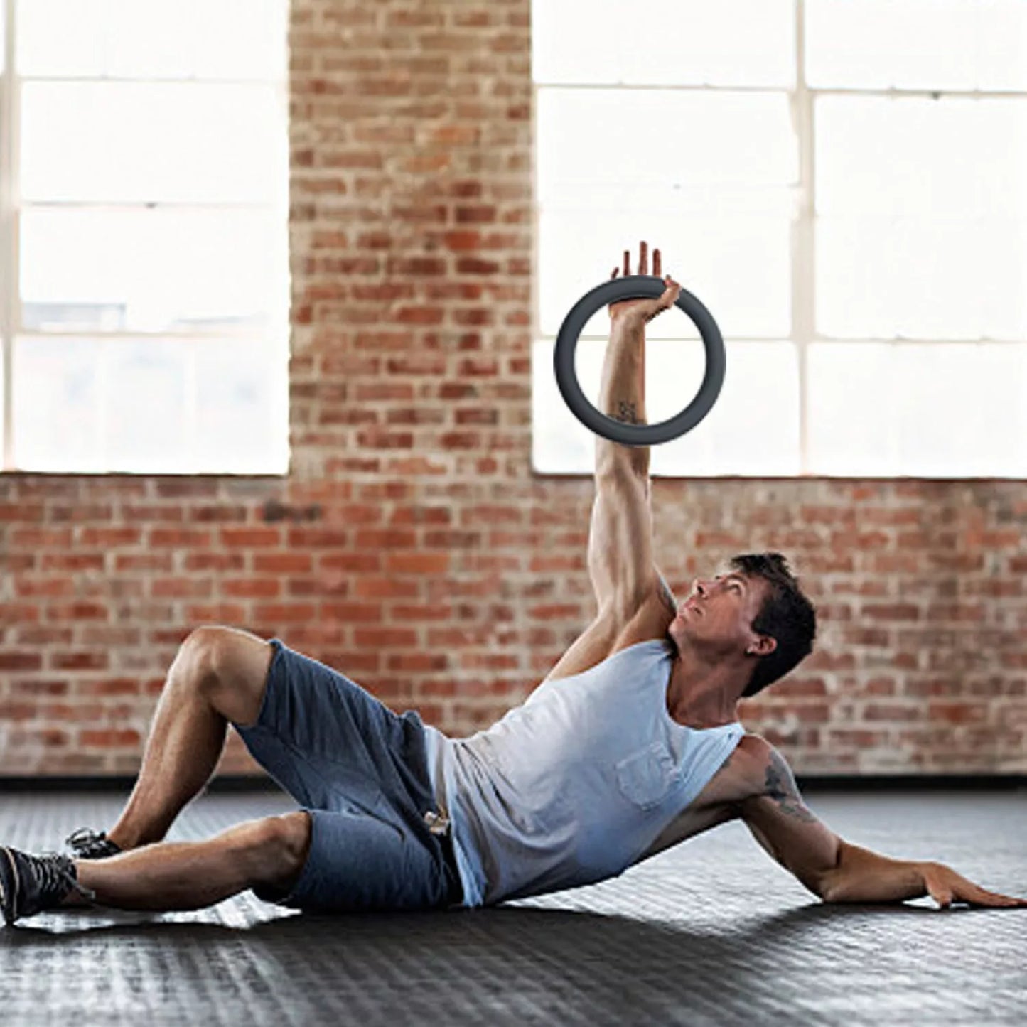 Black and pink silicone load bearing hoop for home fitness training