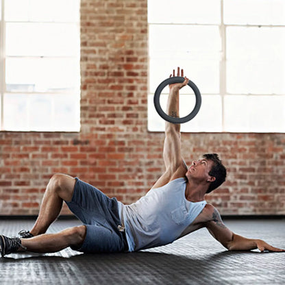 Black and pink silicone load bearing hoop for home fitness training