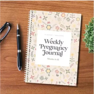 A5 Pregnancy Weekly Diary Notebook open to show weekly layout pages