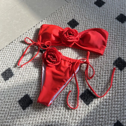Women's adjustable drawstring tube top swimsuit with high-cut briefs in a solid colour.