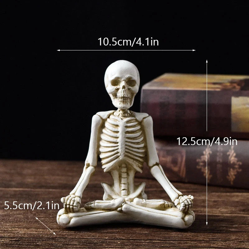 Spooky skeleton desktop decorations featuring intricate resin skulls and skeletons in vintage white and ominous black color options
