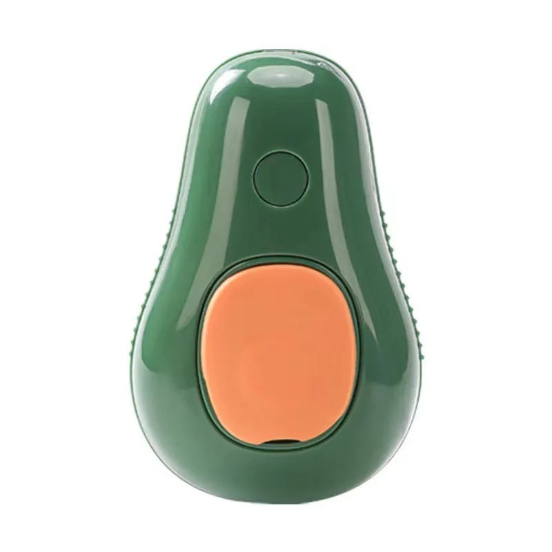 Green avocado-shaped pet grooming spray brush with comb for dogs and cats on a white background.