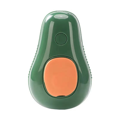 Green avocado-shaped pet grooming spray brush with comb for dogs and cats on a white background.