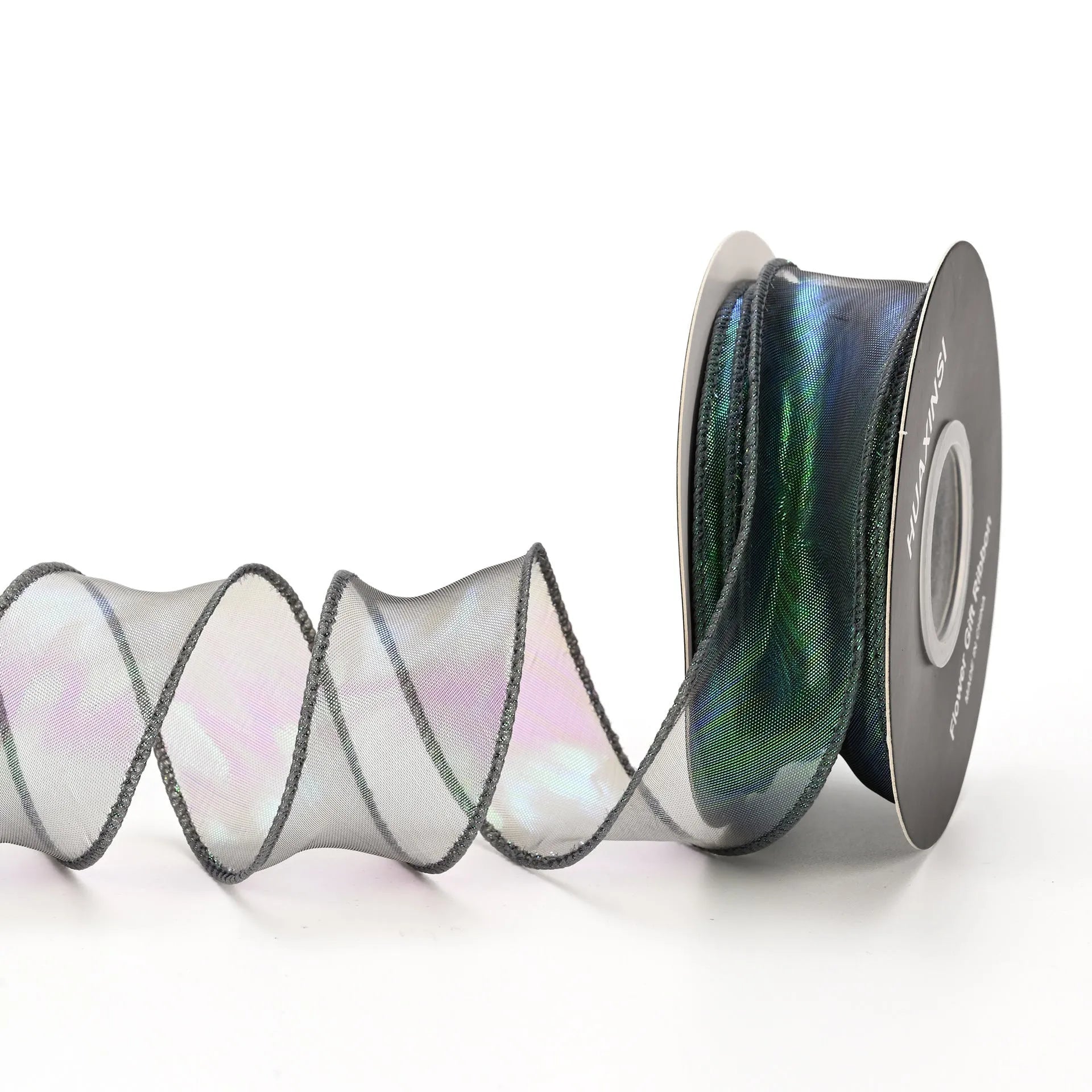 Fishtail yarn ribbon roll showing 4cm width and edge cutting detail in illusion colour options