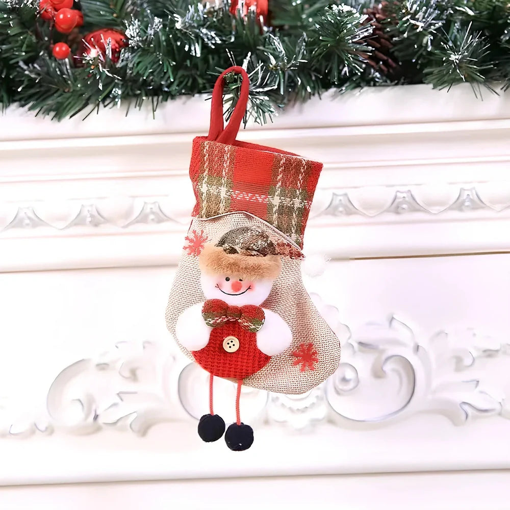 Christmas stocking gift bag measuring 10x20cm with festive character designs