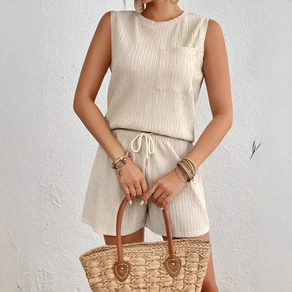 Solid colour sleeveless round neck vest and shorts set in apricot or orange, 100% polyester fabric
