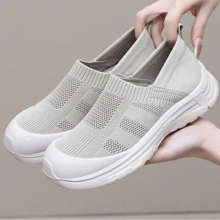 Women's one pedal shoes with soft PVC sole and cloth upper, available in black, milky white and purple flat-heel colours, oversleeves design for easy wear in EU sizes 35 to 42