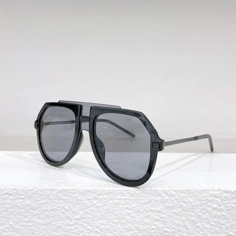 Women's large frame sunshade glasses in black leopard print design featuring elliptical shape, suitable for round, long, square and oval faces, made from board frame with PC lenses and including lens cloth and box.