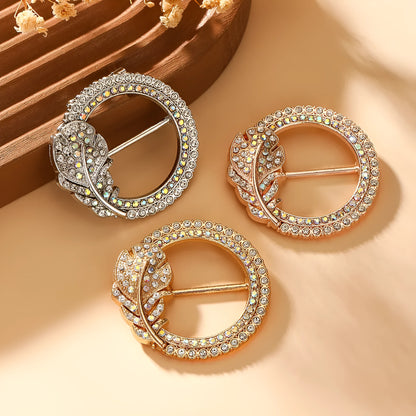 Bow-shaped waist-cinching accessory clip for high-end brooches, alloy with electroplating and diamond inlay, shown in gold, silver, or rose gold finishes.
