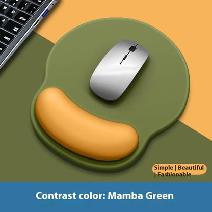 Silicone mouse mat with wristband in a gradient blue black colour pattern on a desk.