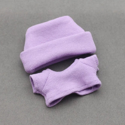 Doll clothes set with knitted flanging hat and T-shirt in multiple colours including pink, white, and stripes.