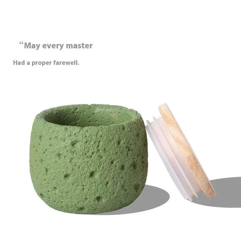 Handmade cement pet cinerary casket in rectangular shape with handcrafted texture, shown in one of six available colours