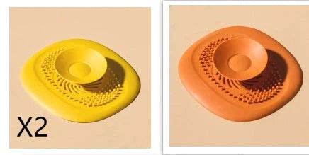 TPR vortex design sink drain cover in twilight orange, quiet blue, mango yellow, and gentian green