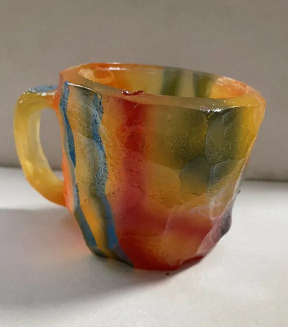 400ml resin mineral crystal coffee mug with handle in assorted colours including purple, blue, and pink.