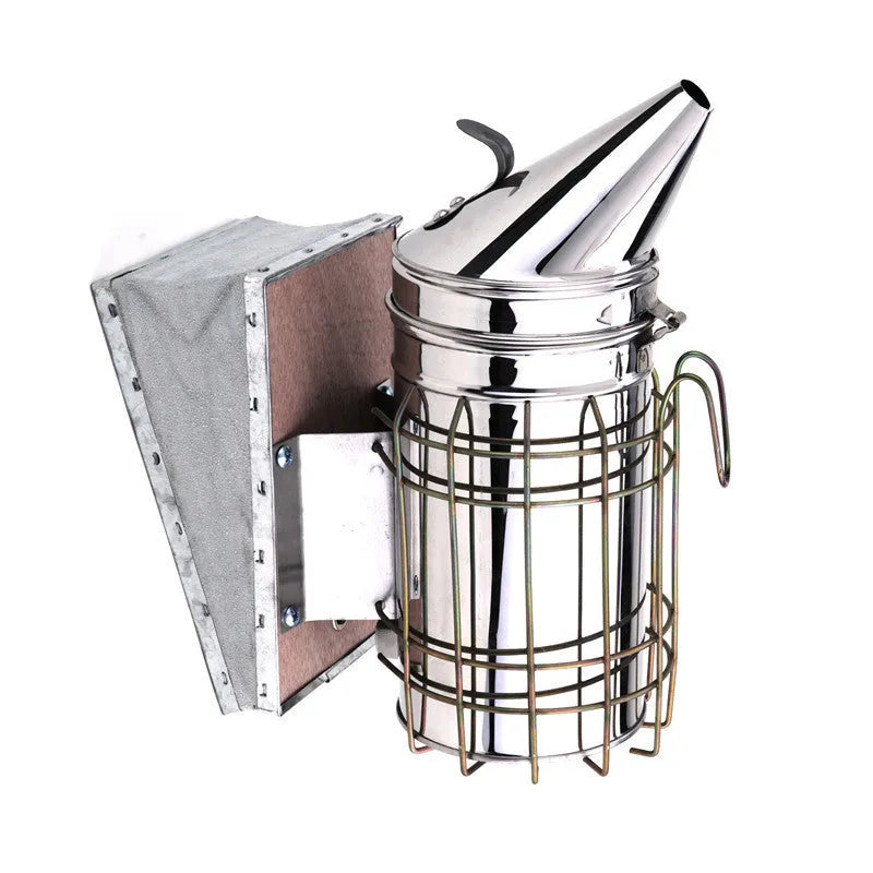 Manual smoke blower for beekeeping made from stainless steel and leather with 10.5cm diameter barrel and 28cm height weighing 780g for hive management and agricultural applications