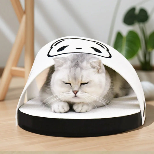 White slipper style cat scratch board made from corrugated paper measuring 30cm length