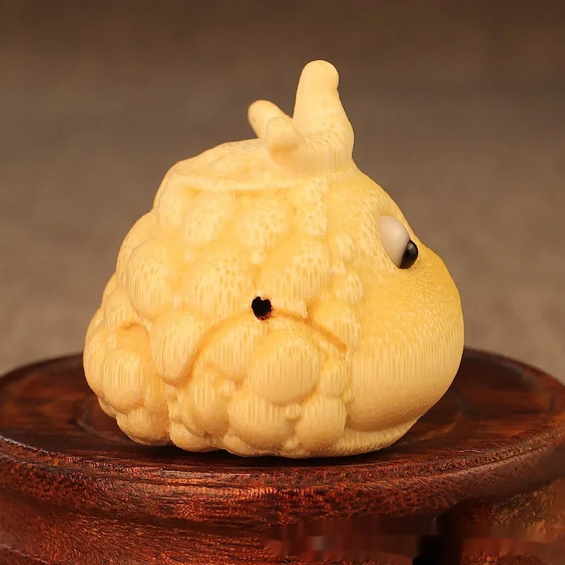 Solid bamboo carving ornament showing Crown Princess toad design with 5.0 live eye specification and hand-carved details
