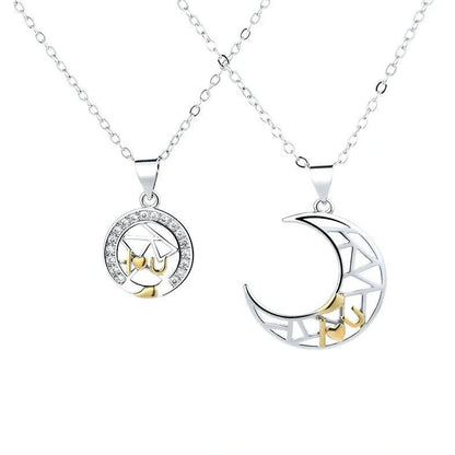 Sun Moon Tooth Couple Necklace showing electroplated copper pendants on 45cm cross chain