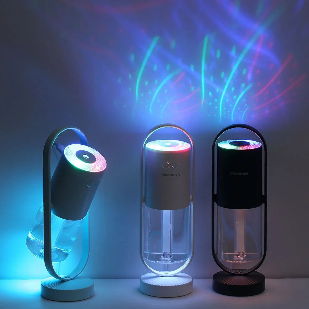 Portable USB humidifier with 200ml water tank in pink, blue, or white showing compact 70x66x213mm dimensions