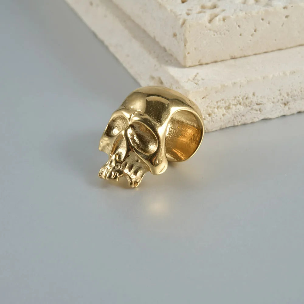 Personalised stainless steel hollow skull Buddha earrings showing 1.5 cm diameter and electroplated colour options