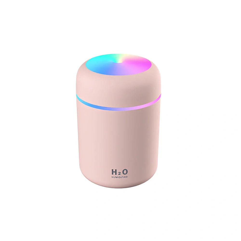 Car USB humidifier with colourful lights and 300ml water tank showing spray operation