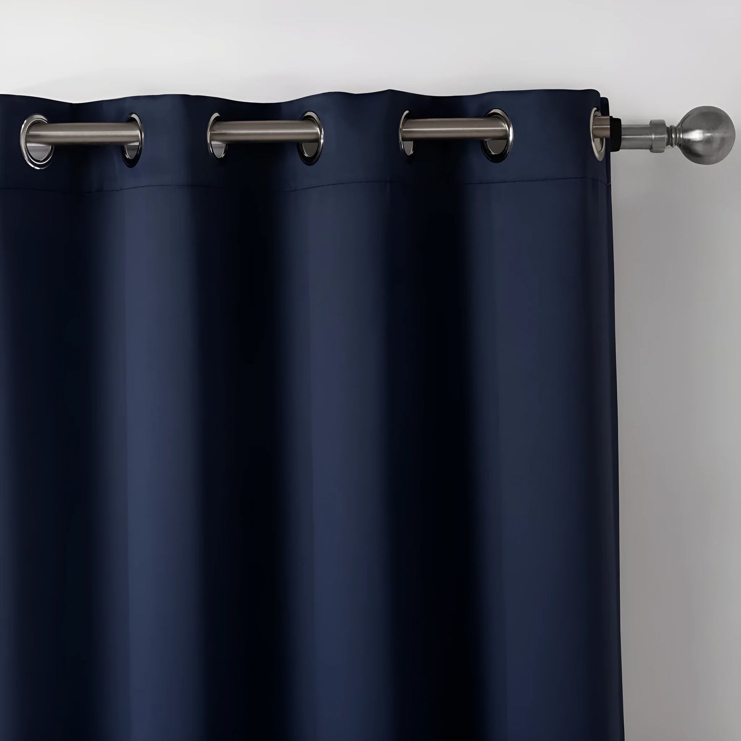 Dark navy blue blackout bedroom curtains hanging with modern simple style