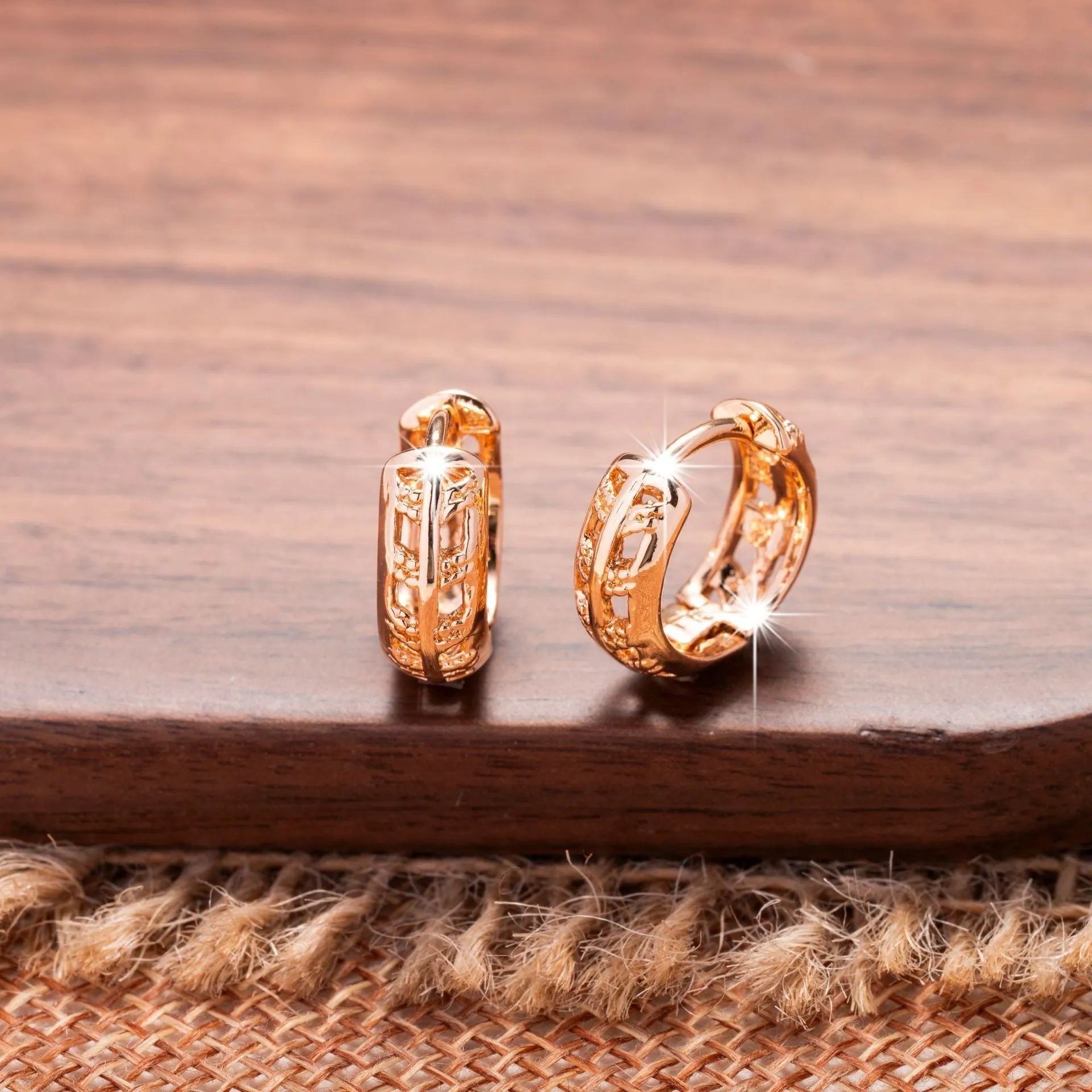 Copper heart and leaf shaped earrings with hollowed-out design and rose gold finish